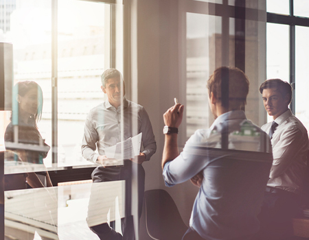 Business people having discussion in board room