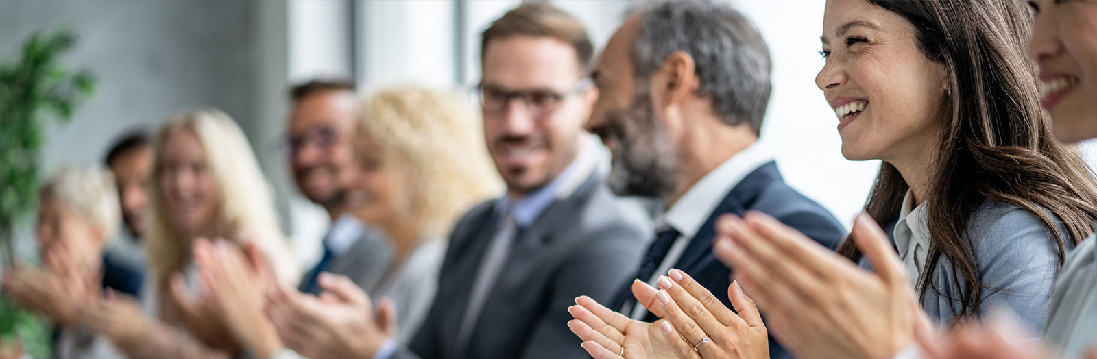 Joyful Professionals Celebrating with Applause